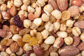 background of mixed nuts and raisins