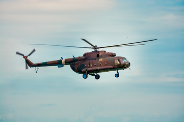 Military Russian helicopter in the sky