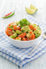 Salsa from avocado, cherry tomatoes and lime.