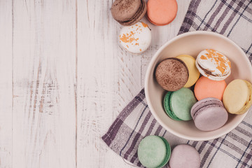 Top view of set macaron on white table background. Traditional french dessert. Delicious food