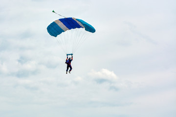 skydiver hovers in the sky