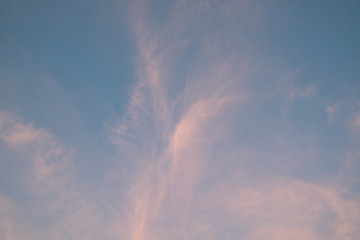 red and blue sunset sky , cirrus cloudy background .
