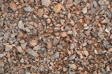 ground textured with rock and stone .