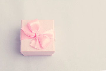 Pink gift box, light background, copy space, for records, text, advertising, close up, top view