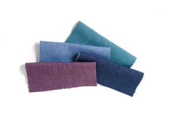 Bright collection of gunny textile samples. Fabric texture background.