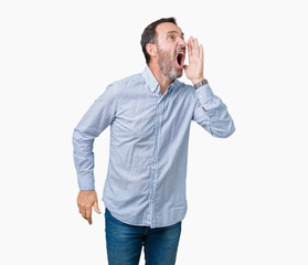 Handsome middle age elegant senior man over isolated background shouting and screaming loud to side with hand on mouth. Communication concept.