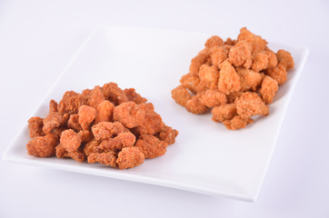 Pop chicken fried on a white background