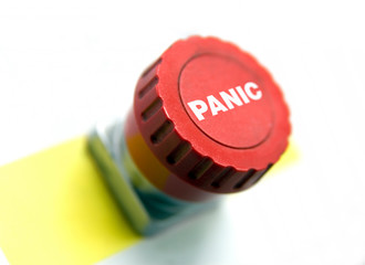Red panic button close-up concept