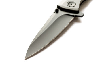 Blade of black color. Black blade on a white background at an angle.