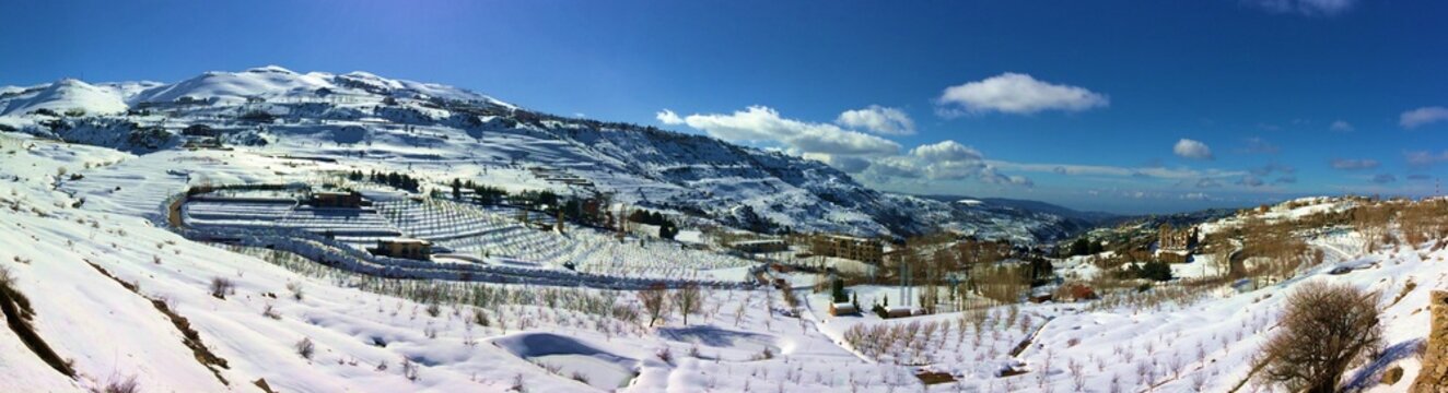 panorama of winter mountains in Kfardebiane, Lebanon, with beirut in a far end