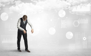 Fototapeta premium Workaholic businessman dreaming about his work, report, graphs and charts 