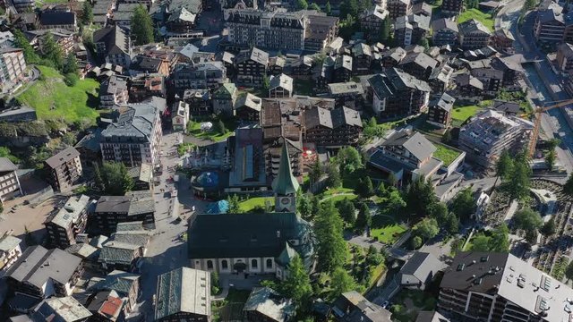 Aerial view of Zermatt, town under famous mountain Matterhorn, turn of spring and summer - landscapes of Swiss Alps from above, Switzerland, Europe