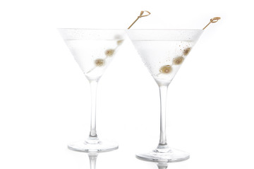Classic Dry Martini with olives isolated on white background