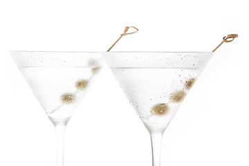 Classic Dry Martini with olives isolated on white background