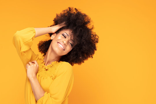 Happy afro woman with beautiful smile.