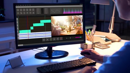 post production, deadline and technology concept - female editor working on video file on computer at night office