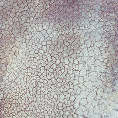 Aerial view of surrealistic industrial place. Dry surface. Desertic landscape. Human impact on the environment. View from above. Abstract industrial background.