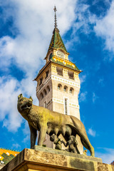 Latinity Memorial in front of the Prefecture, Headquarters of Mures County Council or former City Hall spire in Targu Mures, Mures County, Transylvania Romania