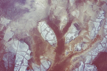 Aerial view of surrealistic industrial place. Dry surface. Desertic landscape. Human impact on the environment. View from above. Abstract industrial background.
