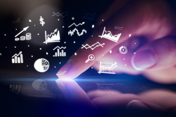 Finger touching tablet with business reports and charts concept
