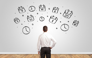 Angry manager looking to wall with drawn overloaded brain concept
