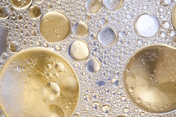 Colourful oil ink bubbles and drops. Abstract template mixed texture background. Wallpaper pattern.