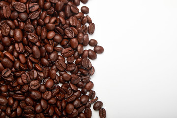 aromatic roasted coffee beans on white background