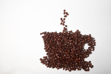 aromatic roasted coffee beans on white background