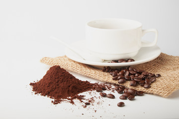 aromatic roasted coffee beans on white background