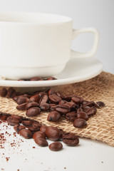 aromatic roasted coffee beans on white background