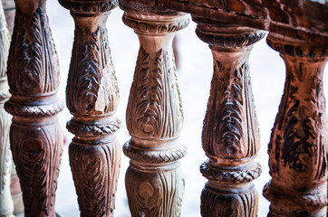 wood artisanal bridge decoration - spanish pillars in plaza del spania, sevilla - obrazy, fototapety, plakaty