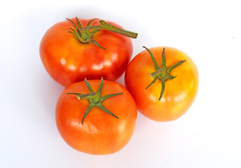 Fresh orange tomatoes, isolated on a white background Concepts, vegetables, kitchen gardens and as a health food. Illustration - lmage