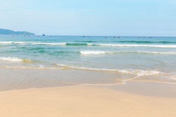 The beach with sea waves