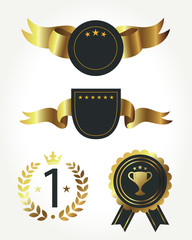 Set of gold awards with red decoration isolated on black.Vector illustration eps10.
