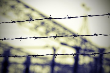 barbed wire in the concentration camp  and the background blurre