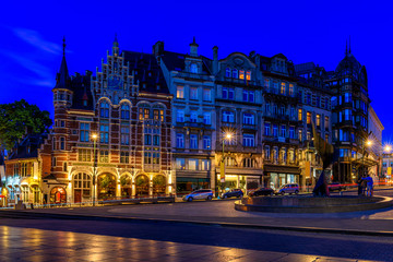 Naklejka premium Old street in center of Brussels, Belgium. Night cityscape of Brussels (Bruxelles). Architecture and landmarks of Brussels.