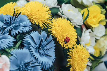 texture - yellow, white and blue decorative flowers