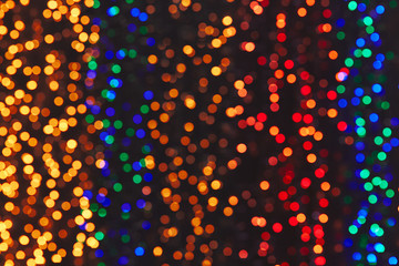 Blurred abstract colorful composition of lights and figured bokeh.