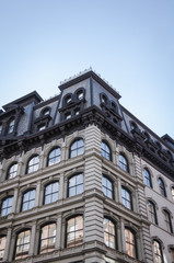 Fototapeta na wymiar View of generic buildings in New York City. Apartment, office rentals.
