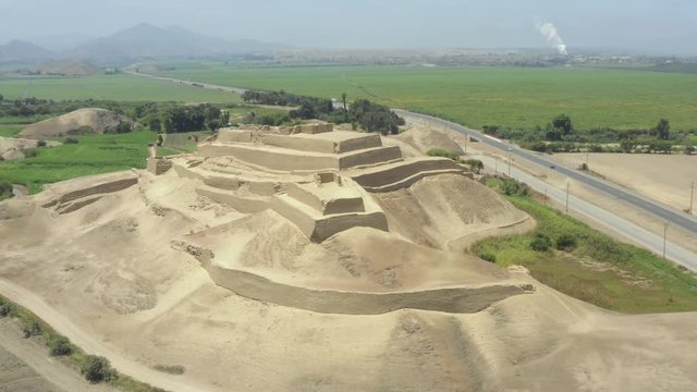 Turn around aerial view Paramonga prehispanic fortress, in Paramonga, Lima, Peru