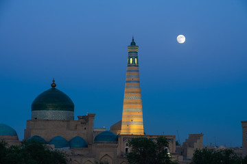 Fototapeta na wymiar The mausoleum, minaret, and the moon