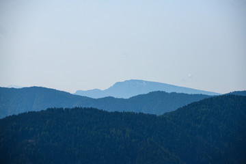 silhouette shades of thre mountain chains in south tyrol