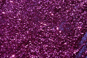 glitter scattered background. brilliance. close-up