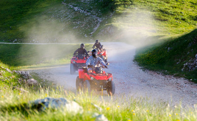 A group of quads riding mountain roads. © Sanja