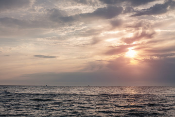 Naklejka na ściany i meble Panorama of beautiful sunset on the ocean.