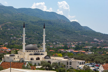 Panoramic view of mosque, old town of Bar and beautiful natural landscape with mountain ranges, Bar, Montenegro