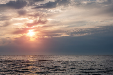 Naklejka na ściany i meble Panorama of beautiful sunset on the ocean.