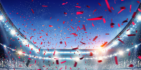 Football stadium background with flying confetti