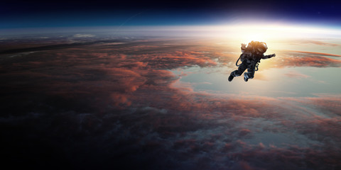 Astronaut in space on planet orbit.