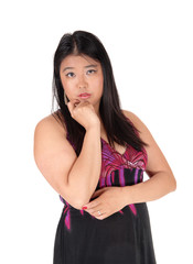 Fototapeta premium A lovely young Asian woman with her hands on her chin